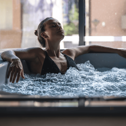 a-young-woman-is-relaxing-in-a-jacuzzi-2026-01-08-23-56-06-utc